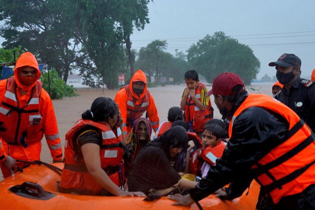 Frantic search for survivors as India’s flood death toll tops 100.